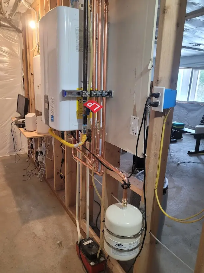 Licensed plumber repairing a kitchen sink in Lemmon Valley